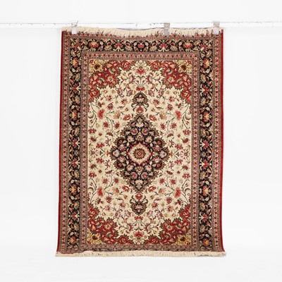 Lot 250 - A wool rug