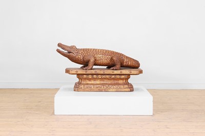 Lot 504 - A carved giltwood model of a crocodile