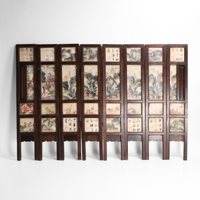 Lot 217 - A carved wood and inset marble eight-fold table screen