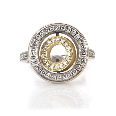 Lot 214 - An 18ct three-colour gold diamond Roulette ring, by Boodles