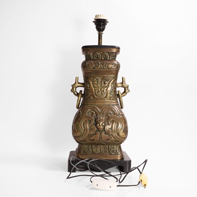 Lot 209 - An archaic-style brass lamp