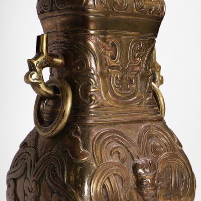 Lot 209 - An archaic-style brass lamp