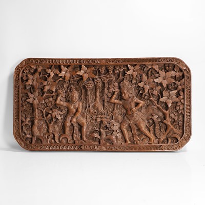 Lot 141 - A carved teak panel