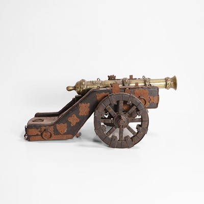 Lot 626 - A miniature brass model of a cannon