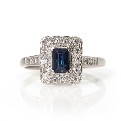 Lot 106 - A sapphire and diamond cluster ring, c.1930's