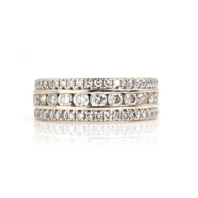 Lot 146 - An 18ct gold diamond three row ring