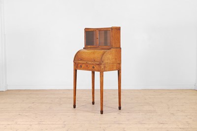Lot 180 - A George III amboyna cylinder writing desk