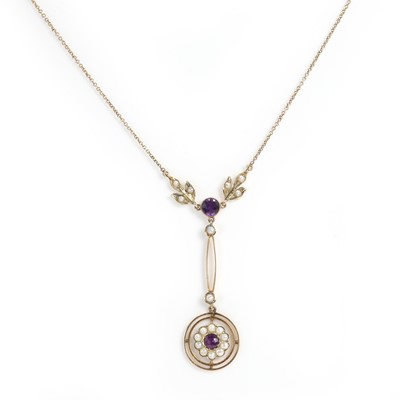 Lot 35 - An Edwardian amethyst and split pearl cluster drop pendant