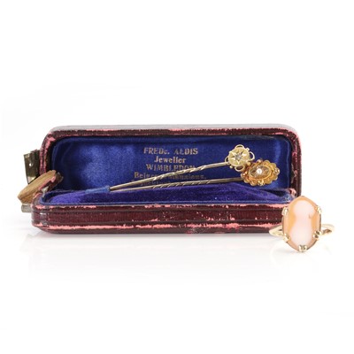 Lot 231 - Two Victorian stick pins and a cameo ring