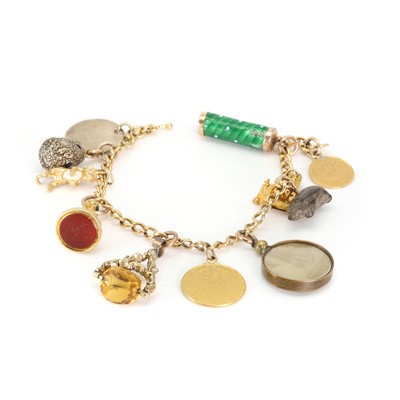 Lot 361 - A gold charm bracelet