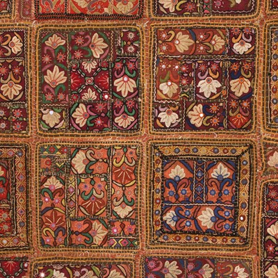 Lot 146 - A large patchwork and embroidered wall hanging