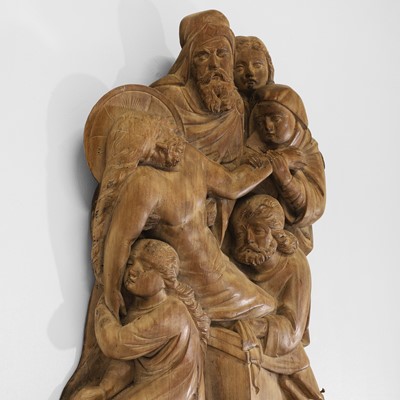 Lot 165 - A large carved walnut relief