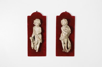 Lot 126 - A pair of baroque carvings of putti