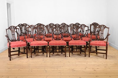 Lot 475 - A set of twenty George III-style mahogany dining chairs