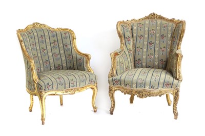 Lot 413 - A matched pair of Louis XVI style giltwood bergeres