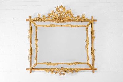 Lot 123 - A carved giltwood and gesso wall mirror