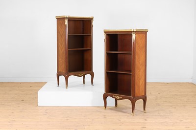 Lot 15 - A pair of small Louis XVI Transitional-style mahogany, tulipwood and gilt-bronze bookcases