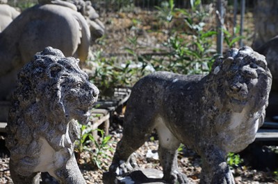 Lot 376 - A pair of reconstituted stone lions