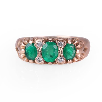Lot 92 - A 9ct gold emerald and diamond ring