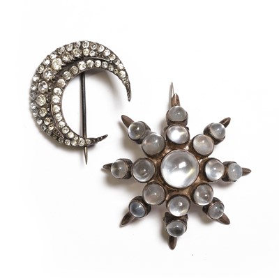 Lot 27 - A Victorian silver moonstone brooch and a paste crescent brooch
