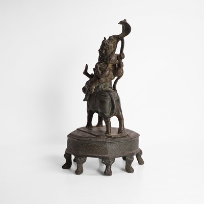 Lot 86 - A bronze figural group