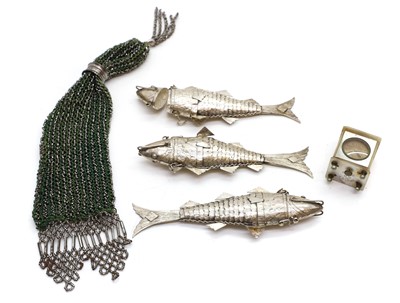 Lot 22 - Three white metal articulated fish
