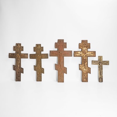 Lot 33 - A group of four brass crucifixes