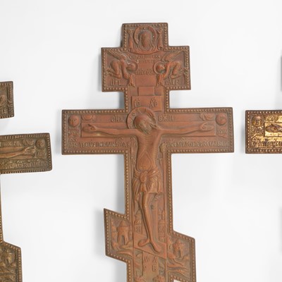 Lot 33 - A group of four brass crucifixes