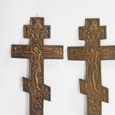 Lot 33 - A group of four brass crucifixes