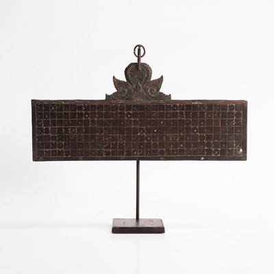 Lot 263 - A carved wood calendar