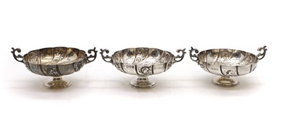 Lot 56 - A set of three silver bon bon dishes