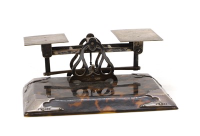 Lot 95 - A tortoiseshell and silver mounted set of letter scales