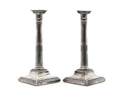 Lot 52 - A pair of George III silver candlesticks