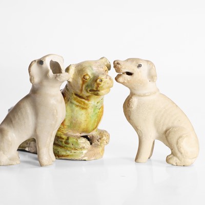 Lot 53 - A Chinese sancai-glazed dog