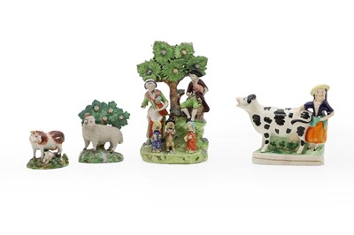 Lot 290 - A group of Staffordshire pottery figures