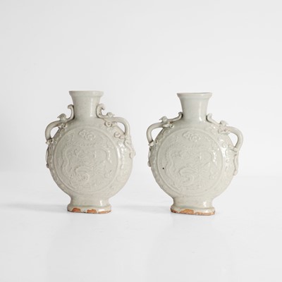 Lot 3 - A pair of Chinese qingbai-glazed moon flasks