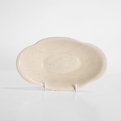 Lot 2 - A Chinese white-glazed ear cup