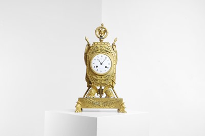 Lot 394 - An Empire ormolu mantel clock