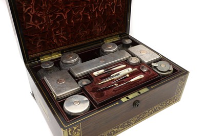 Lot 361 - A Regency rosewood and brass inlaid vanity box
