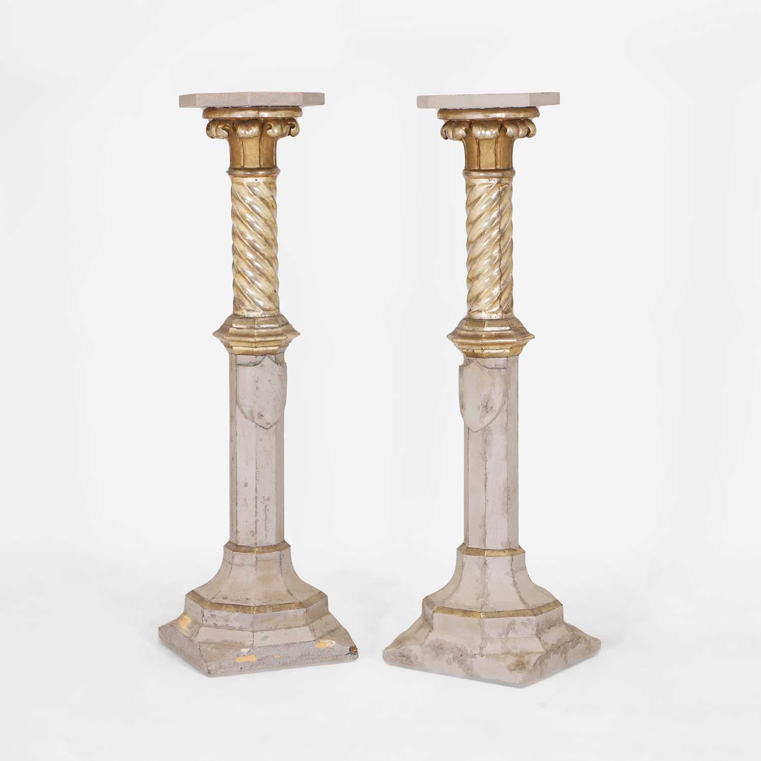 Lot 73 - A pair of parcel-gilt pedestals