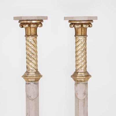 Lot 73 - A pair of parcel-gilt pedestals