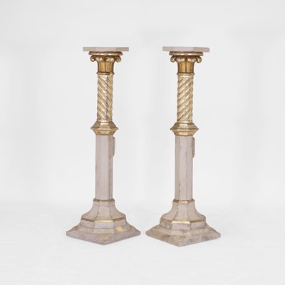 Lot 73 - A pair of parcel-gilt pedestals