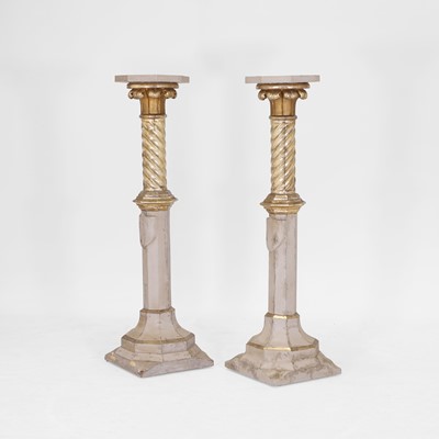 Lot 73 - A pair of parcel-gilt pedestals