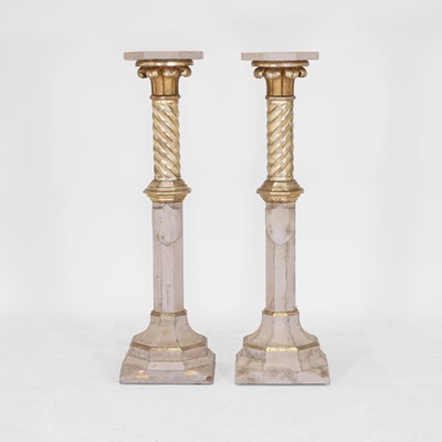 Lot 73 - A pair of parcel-gilt pedestals