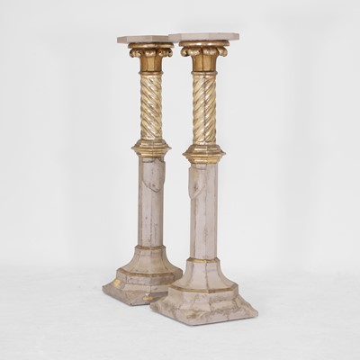 Lot 73 - A pair of parcel-gilt pedestals