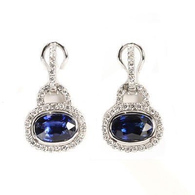 Lot 237 - A pair of 18ct white gold sapphire and diamond drop earrings