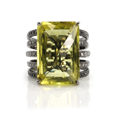 Lot 295 - A large citrine and diamond cocktail ring