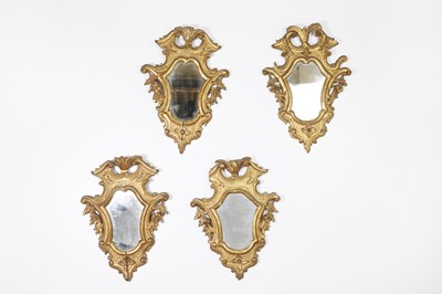 Lot 411 - A set of four carved giltwood mirrors