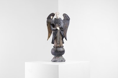 Lot 531 - A carved polychrome, wood and ivory Santos figure