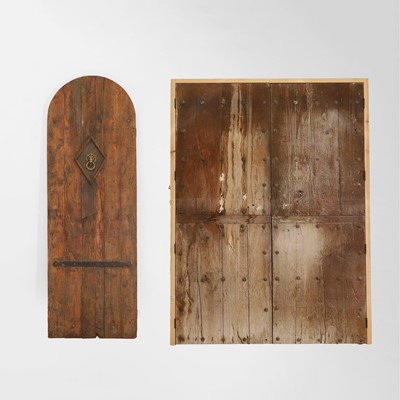 Lot 315 - An arched panelled door